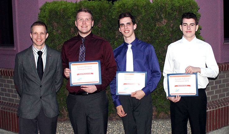 Left to right: Westview Secondary School IT Instructor Todd Goodman with his students Trevor Dean (Microsoft PowerPoint 2013 National Champion), Nash Taylor (Microsoft Excel 2013 National Champion), and Phillip MacBride (Microsoft Word 2013 National Champion).